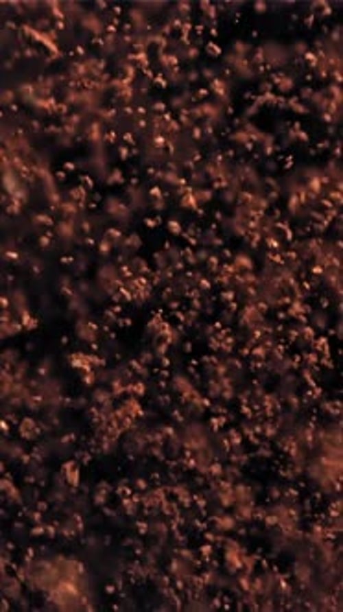 Ground Coffee Flies Up and Falls Down Filmed on a Highspeed Camera at 1000 Fps