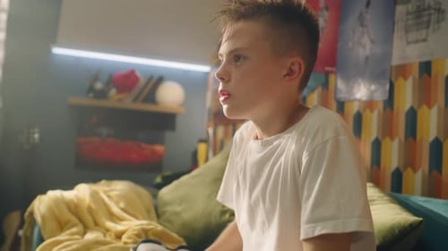 Teen Using Virtual Reality Headset at Home