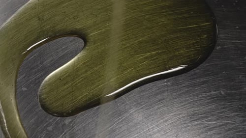 Close-up view, Olive Oil in Saucepan, Cooking Pasta Bolognese - Steady Shot