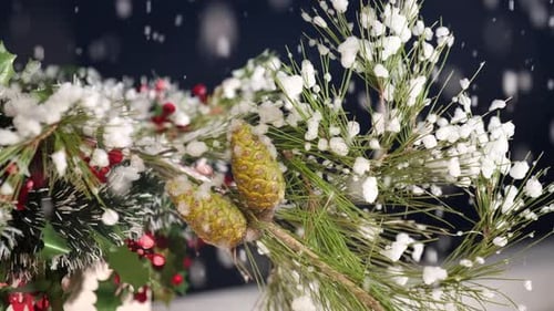 Snow Covered Christmas Arrangement with Pine and Holly