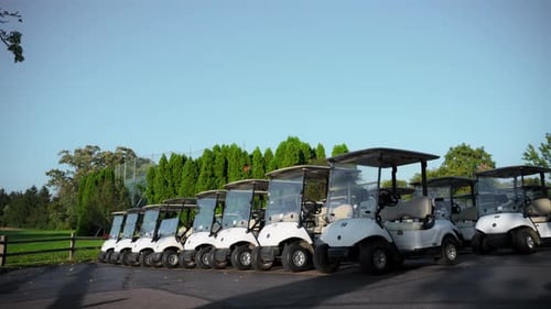 Wide View of Golf Carts Parked in the Designated Area at a Golf Club Neatly Arranged Electric