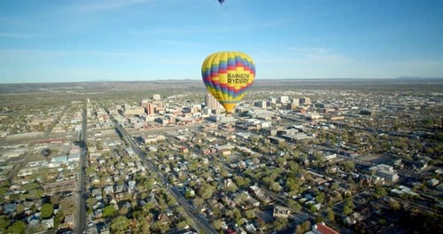 Hot Air Balloon Above New Mexico City Skyline By Aerial Drone Slow Motion