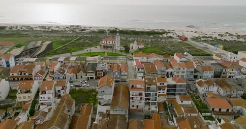 drone flight over a typical Portuguese coastal town on the Atlantic coast