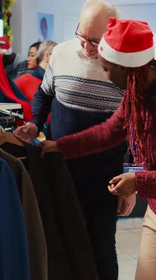 Man Shopping for Clothes During Christmas Season