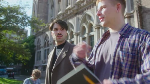 Male Friends Walking on College Campus and Chatting