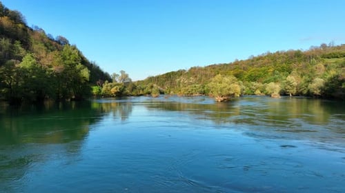 Beautiful emerald river flowing through a green forest valley. Una river, Bosnia and Herzegovina