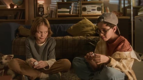 Boys Playing Card Game Indoors