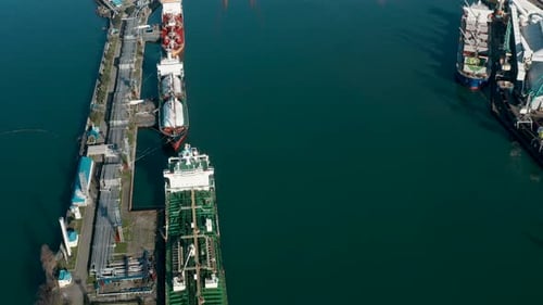 Aerial Drone View Ship LPG Gas and Oil Tankers Loading in Gas and Oil Terminal Station Refinery