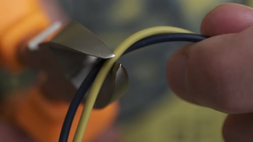 Cutting Wire With Wire Cutters Close Up
