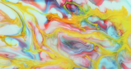 Dynamic Abstract Ink Patterns in Yellow, Orange, and Blue