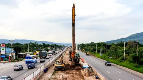 Highway Construction With Heavy Equipment and Traffic