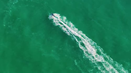 People Riding Jet Ski in Florida Extreme Watersport Recreation