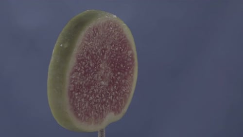 Fig Rotating with Loop on Blue Screen for Chroma Key