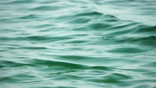 Sea Water Surface Low Angle View Over Clear Azure Sea Water Sun Glare Abstract Nautical Summer Ocean