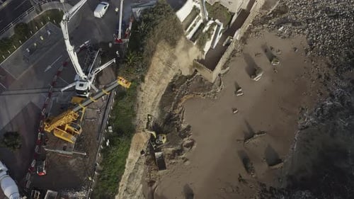 Aerial Top Down Shot of Shoreline Stabilization Work Near Sandy Beach
