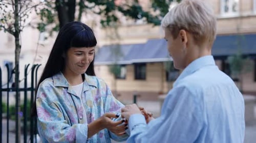 Back View of the Lesbian Partner is Doing Proposal