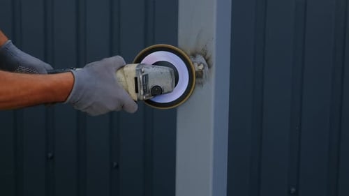 the Master Works with an Angle Grinder Selective Focus