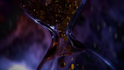 Golden Coins Flowing Through Glass Hourglass Time Lapse