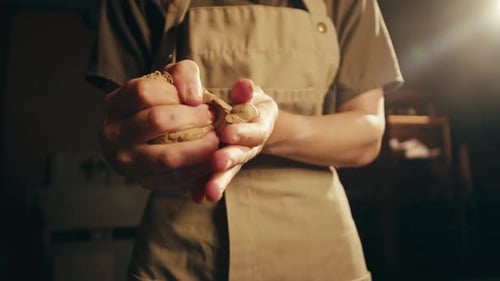 Man Potter Works with Clay on Master Class in Studio Working Process in Ceramic Workshop Potter
