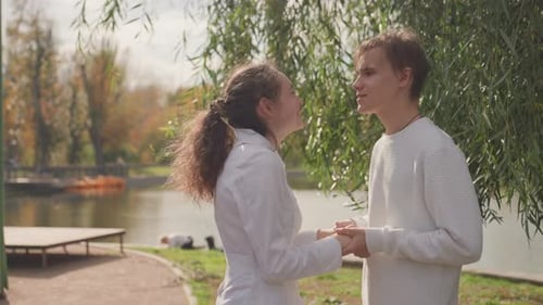 Park Vow Exchange White Couple Holding Hands Willow Backdrop Lakeside Light Autumn Leaves Tender