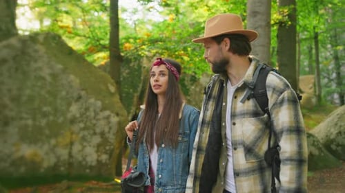 Hiking Travel Couple Walking Together in Beautiful Scenic Green Woods Boyfriend and Girlfriend