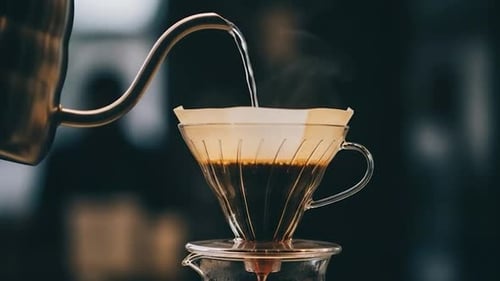 Pouring Hot Water Over Coffee Filter, Close Up