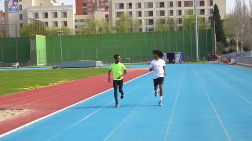 African Runners Training in an Outdoors Athletics Track