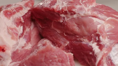 Chef Butcher Cutting Pork Meat with Knife on Kitchen Cooking Mexican Traditional Food Man Cut Big