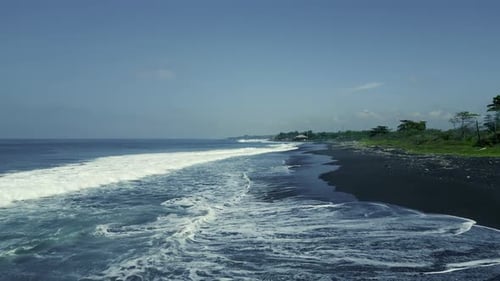 A Beautiful Drone View of Black Sand Beach with Big Waves