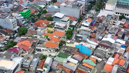 aerial top down view of dense populated residential neighborhood in Jakarta