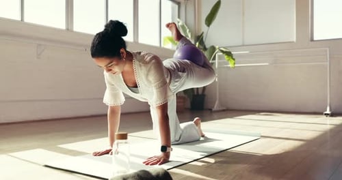 Ball, fitness and yoga with woman in studio for health, holistic routine or wellness