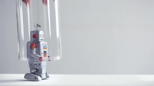 A walking vintage robot get catched with a glass. He tries to move on, but there is no way out.