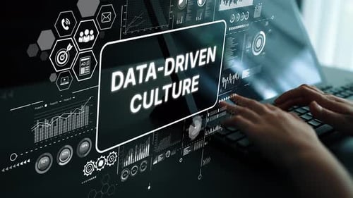 Typing on a Laptop with Data Graphic Overlay