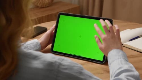 Person Swiping Green Screen Tablet Woman Scrolling Digital Pad with Chroma Key