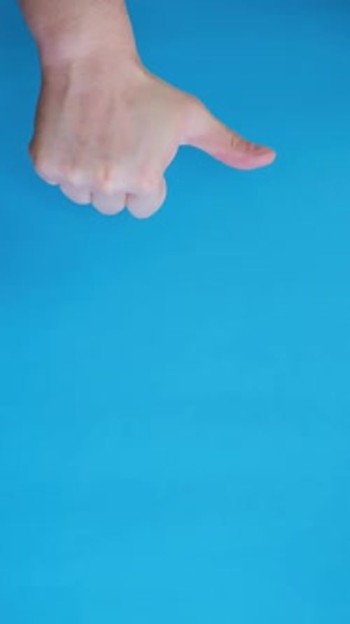 Hand and Finger Pointing on a Blue Screen
