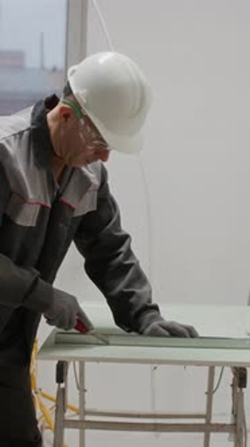 Adult Cuts Panel Wearing Safety Gear