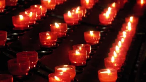 Many Burning Candles in Christian Church