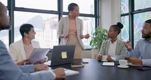 Diverse Business Team Having a Meeting at Workplace