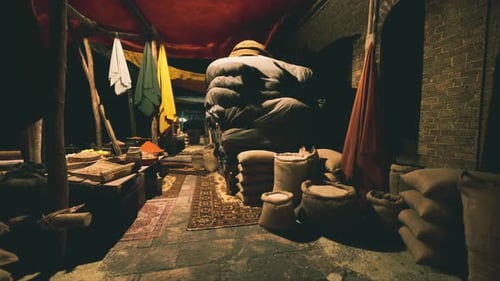 Ancient Market Stall with Flickering Oil Lamp Light
