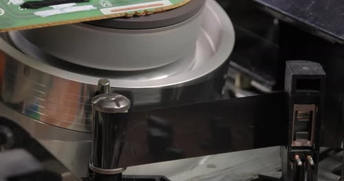 Video helical head vhs mechanism reading a video cassette VHS.