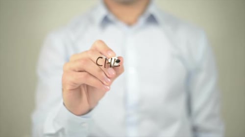 Man Writing Chemical Weapons on Transparent Surface