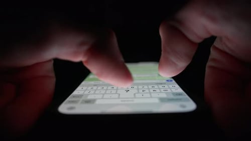 Phone close-up - people communicate using messenger, chat