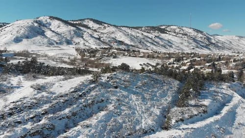 A slow flight over a Golden Colorado after a spring snowstorm.