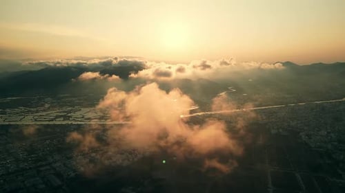 Drone Flying Over the Coastal City and Amazing Green Hills