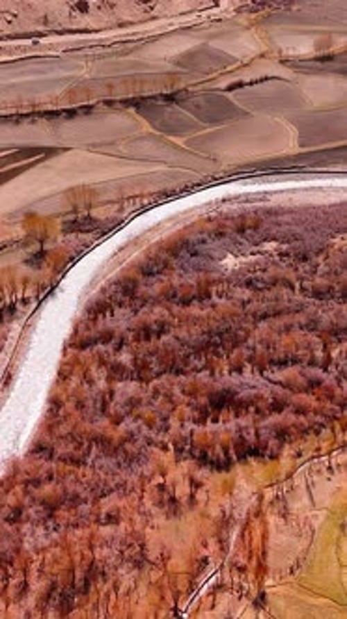 ariel view of farming land and river in drass laddakh