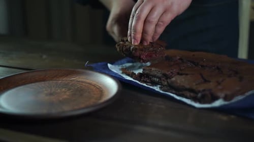 Serving Delicious Homemade Chocolate Cherry Brownie on Plate