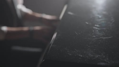Pianist Playing on the Black Grand Piano on Concert Stage Under Spotlight Close Up Blurred Shot of