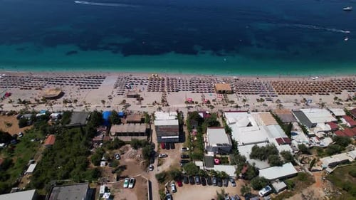 Summer vacation hotels and paradise beach with umbrellas near blue turquoise sea in Mediterranean, A