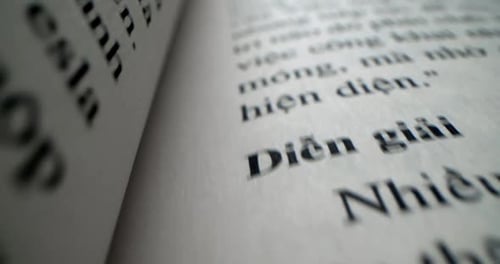 Macro View Shot Moves Between the Pages of the Book