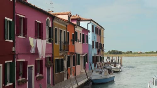 Medium shot of colorful houses at Burano, Venice